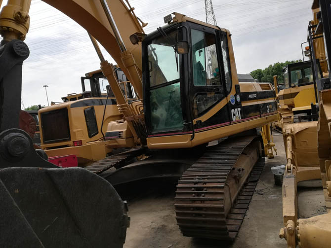 Cat 320BL with Jack Hammer