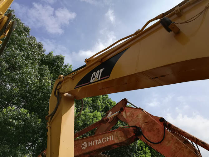 Cat 320BL with Jack Hammer