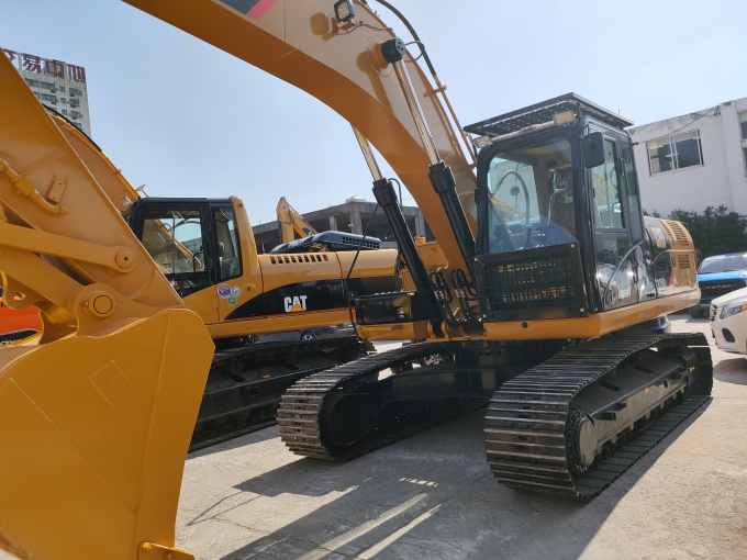 Used Cat 325DL excavator for sale made in Japan - Front left side view