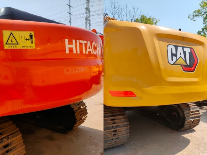 Hitachi and Caterpillar excavators on construction site