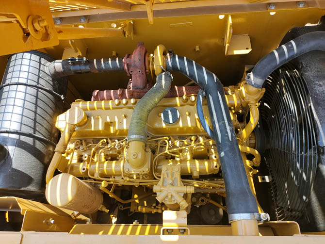 Cat 320 excavator with breaker attachment