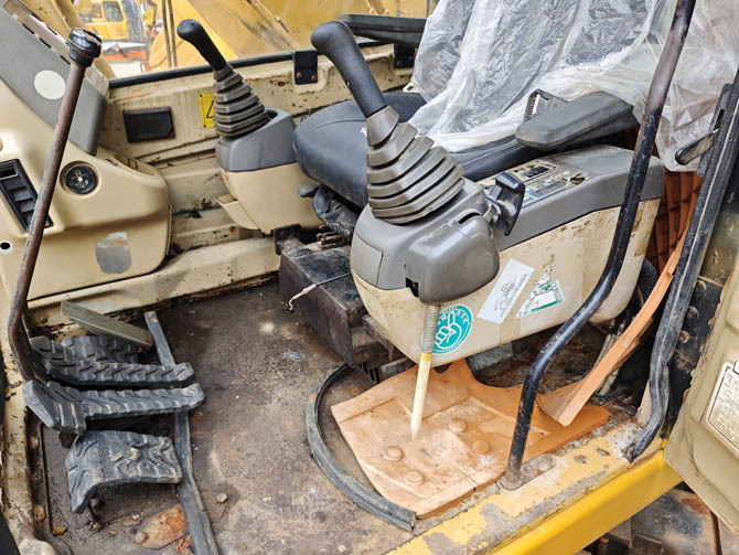 Swamp buggy Cat 320BL excavator in wetland working condition
